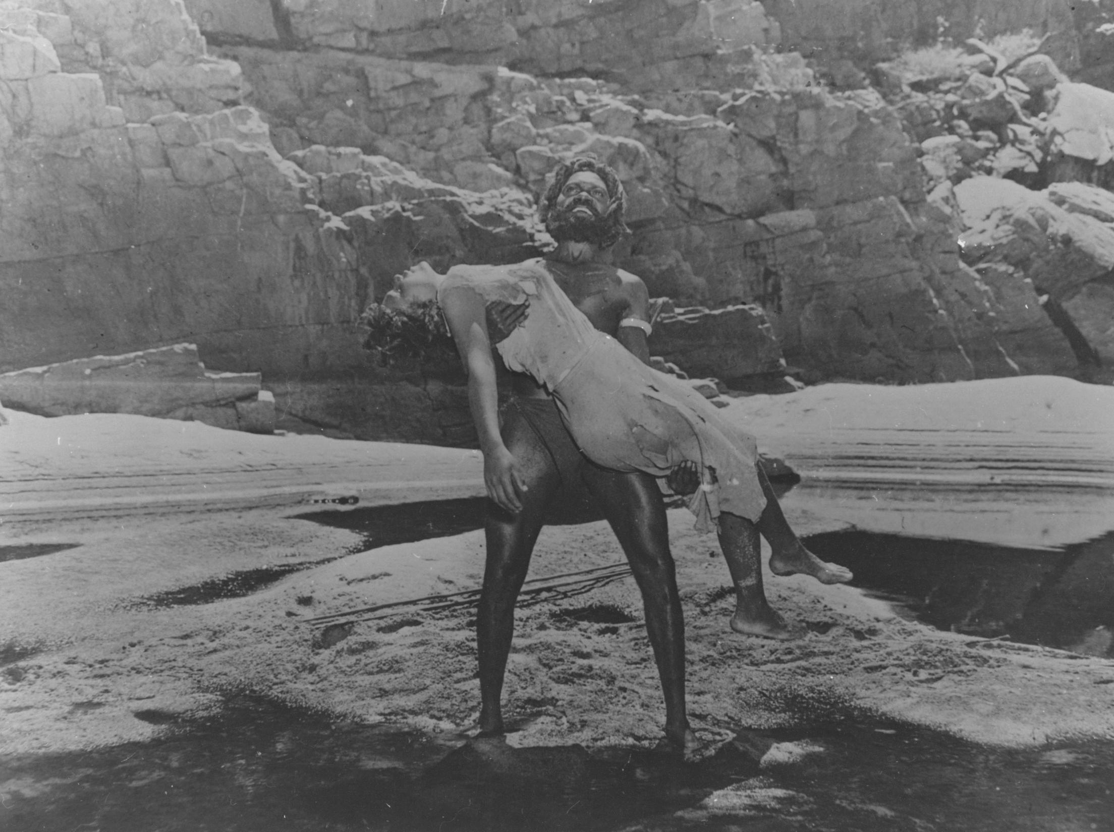 Man carrying a woman 