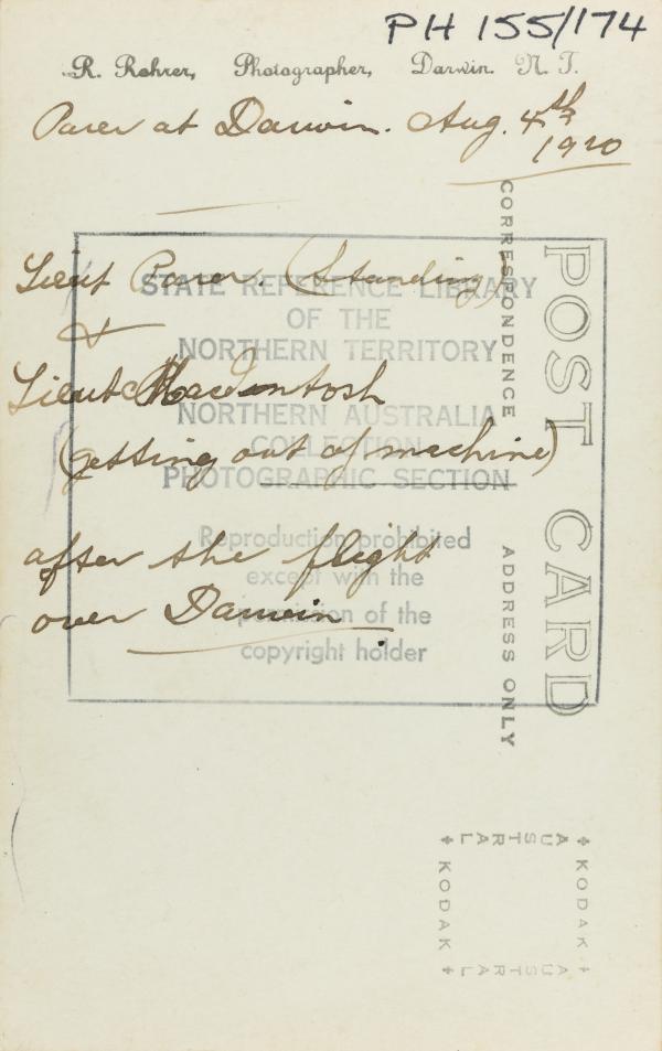 Text on reverse: Parer at Darwin. Aug, 4th 1920. Lieut Parer (Standing) & Lieut MacIntosh (getting out of the machine) after the flight over Darwin.